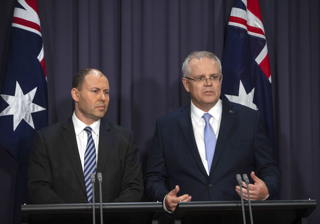 Australian PM starts work as anger over party vote simmers