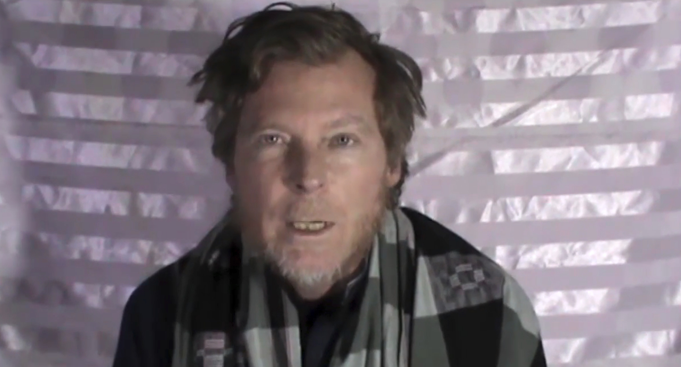 Taliban release video showing American, Australian captives