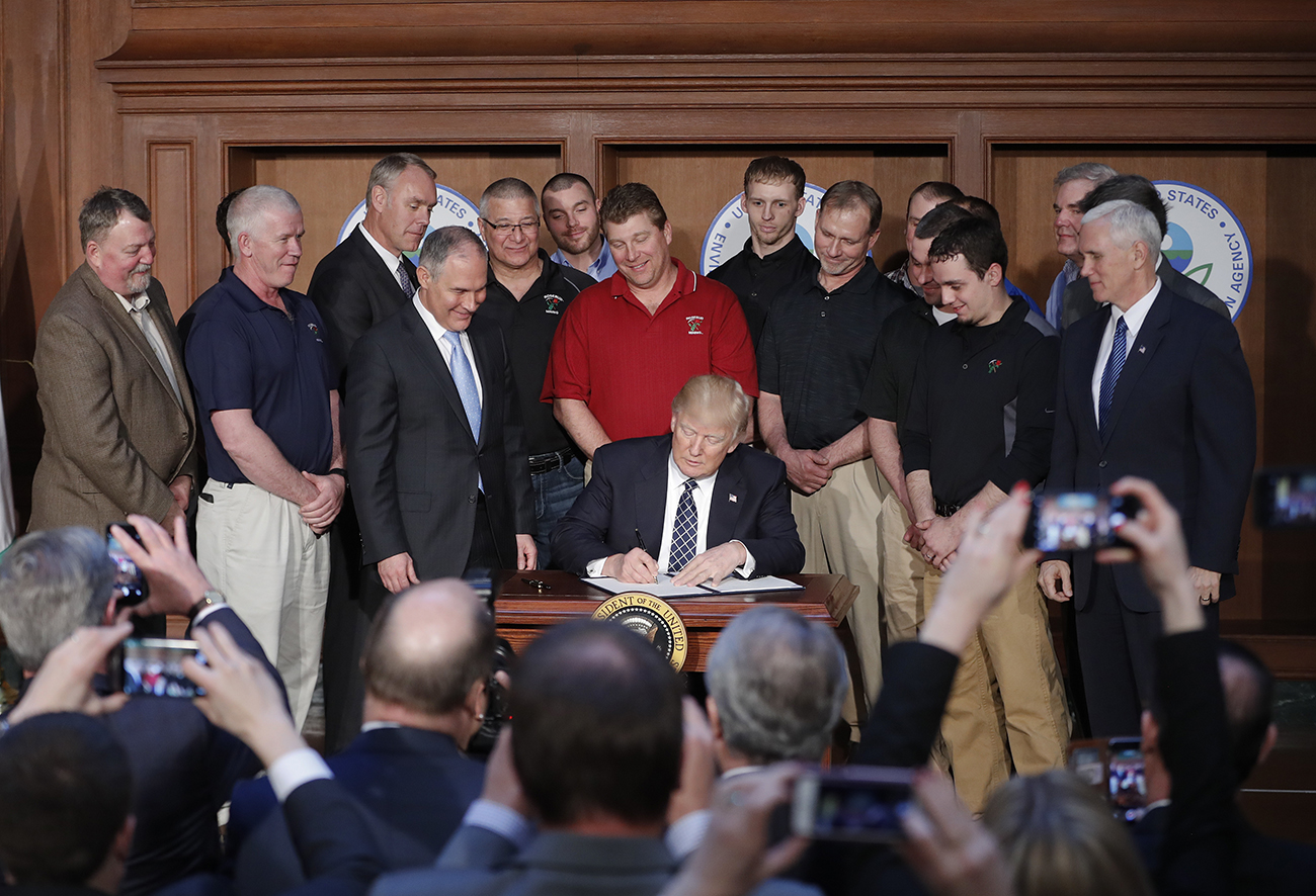 Trump tosses Obama's 'clean' energy plan, embraces coal