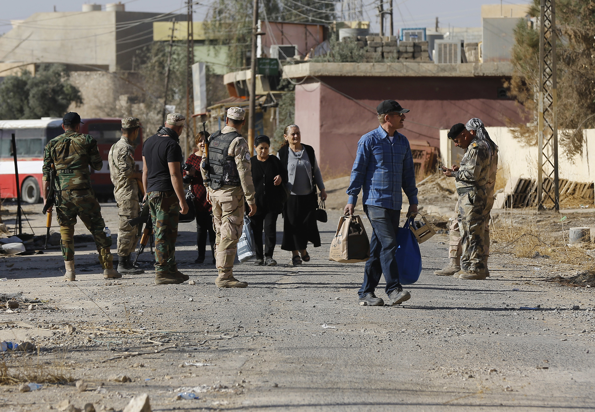 Gasps, tears as Iraqis return to IS-destroyed parish