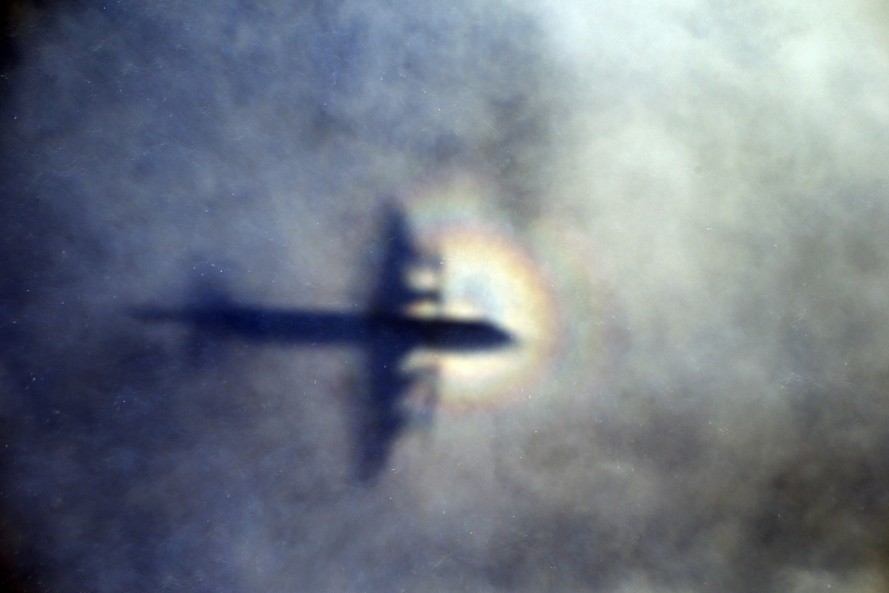 Australia defends end of MH370 hunt; investigation continues