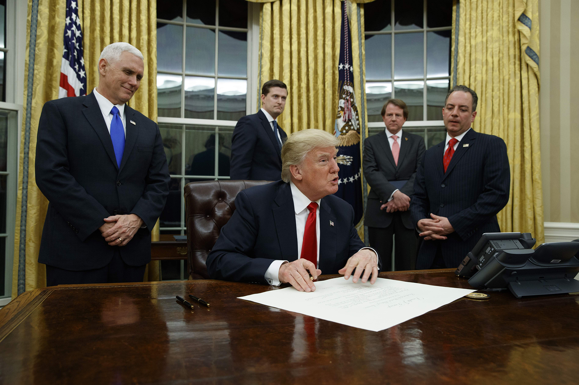 Trump executive order first strike at ending 'Obamacare'