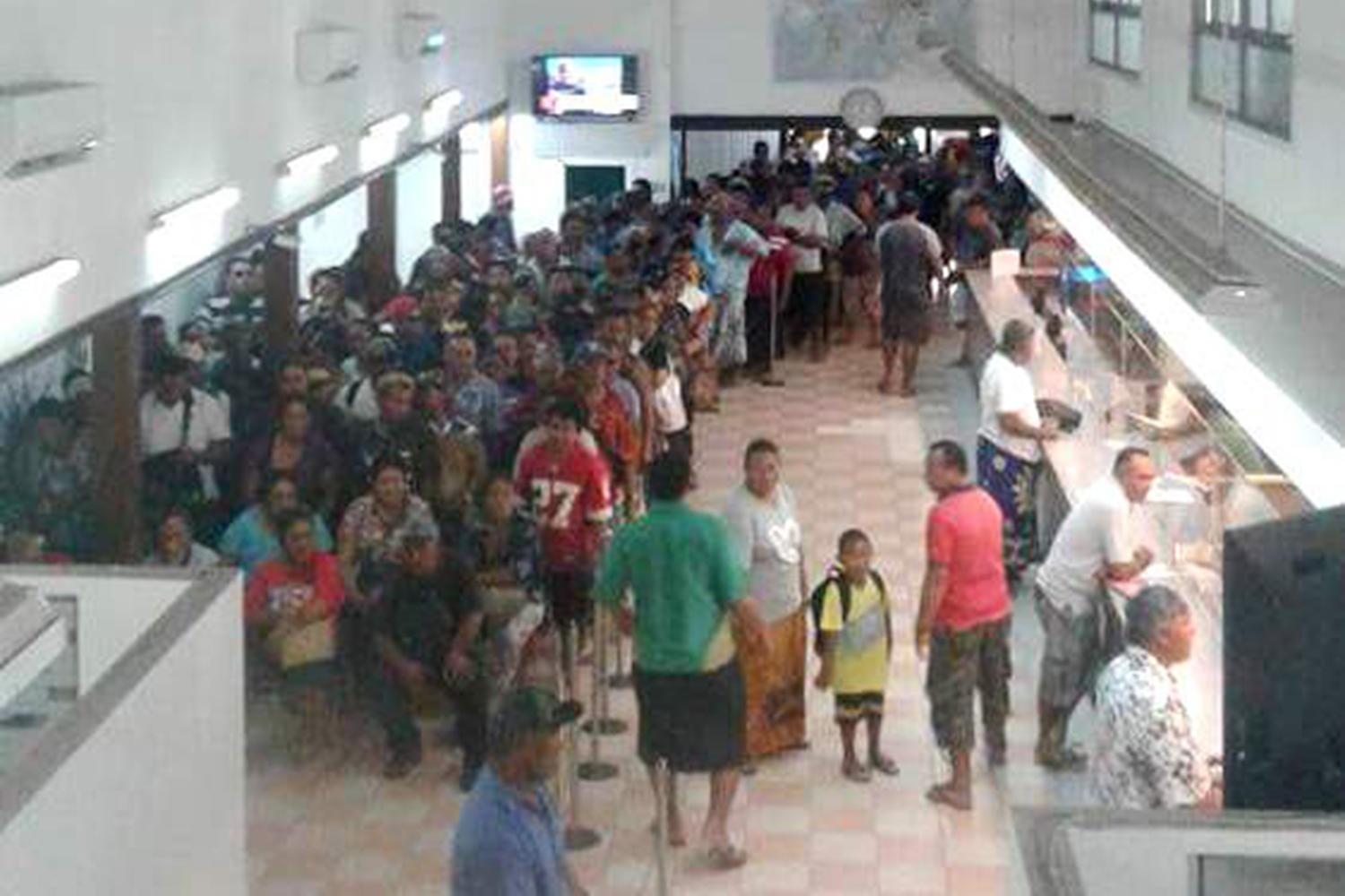 Crowds take bank by surprise