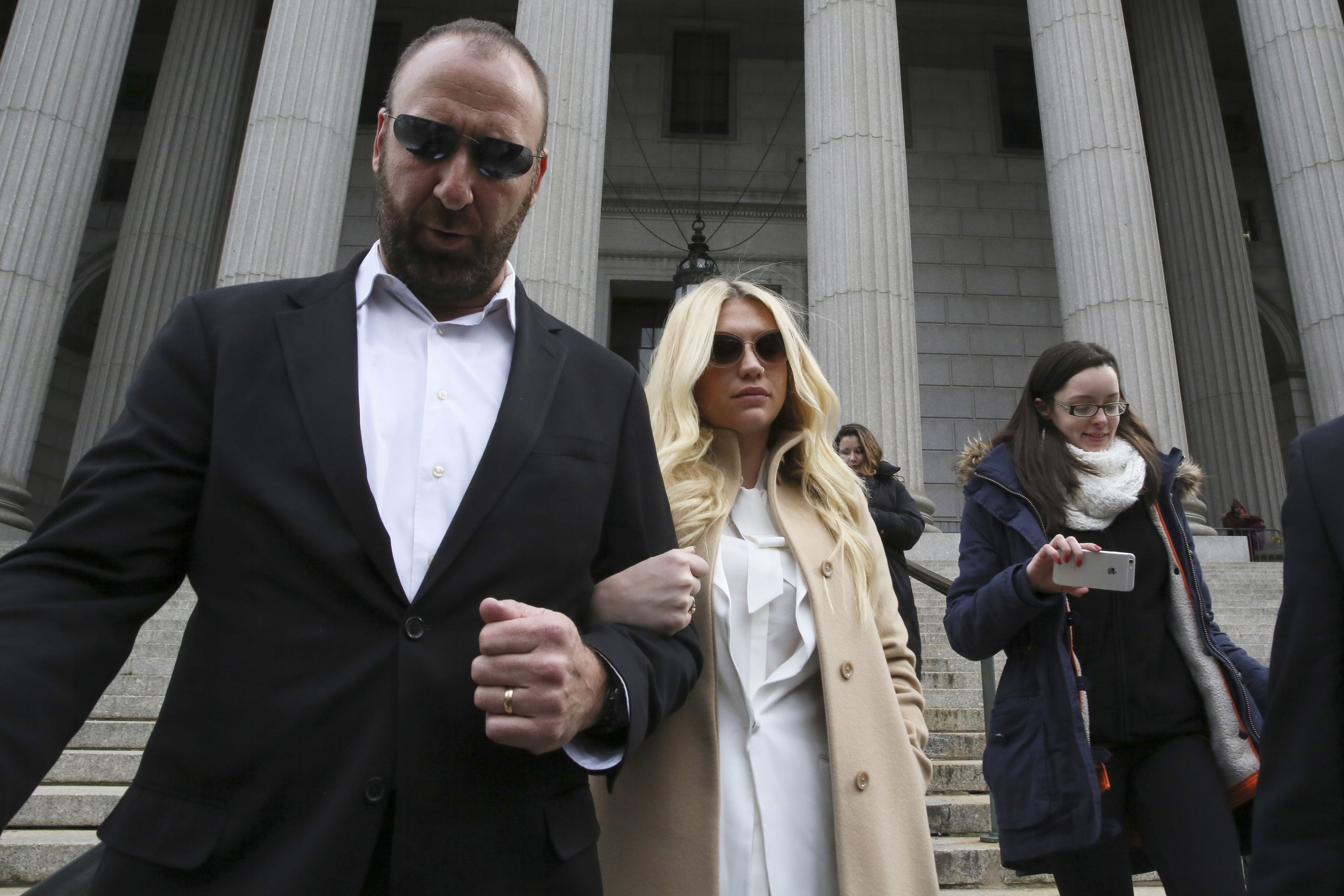 Kesha loses bid to be freed from contract with top producer