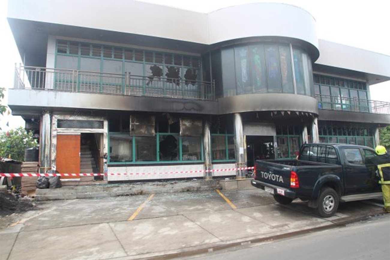 Teen arrested over Coin Save fire