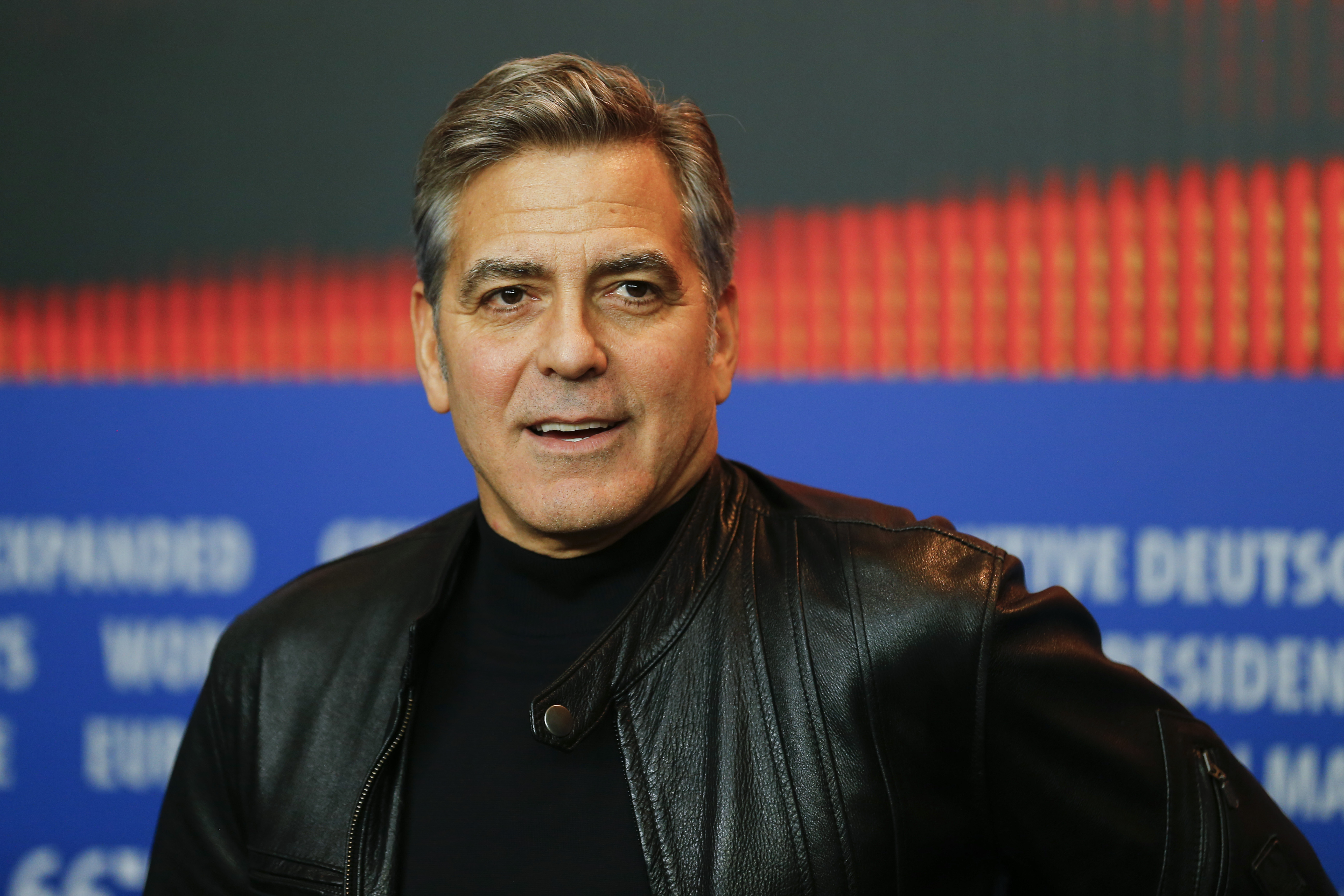 Hosting Clinton fundraisers, Clooney decries political cash